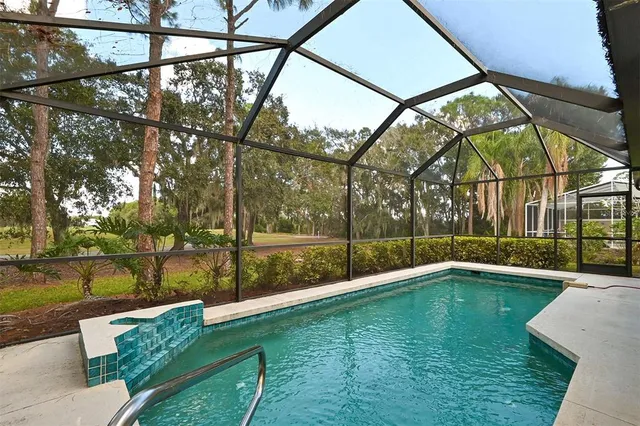 a view of a park with large trees