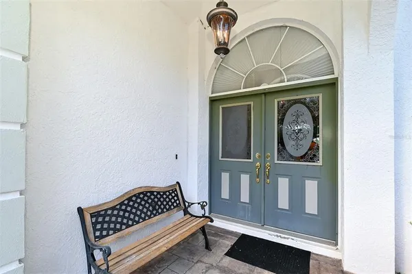 a view of living room filled with furniture and window