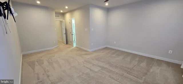 a bathroom with a sink double vanity granite tub and shower