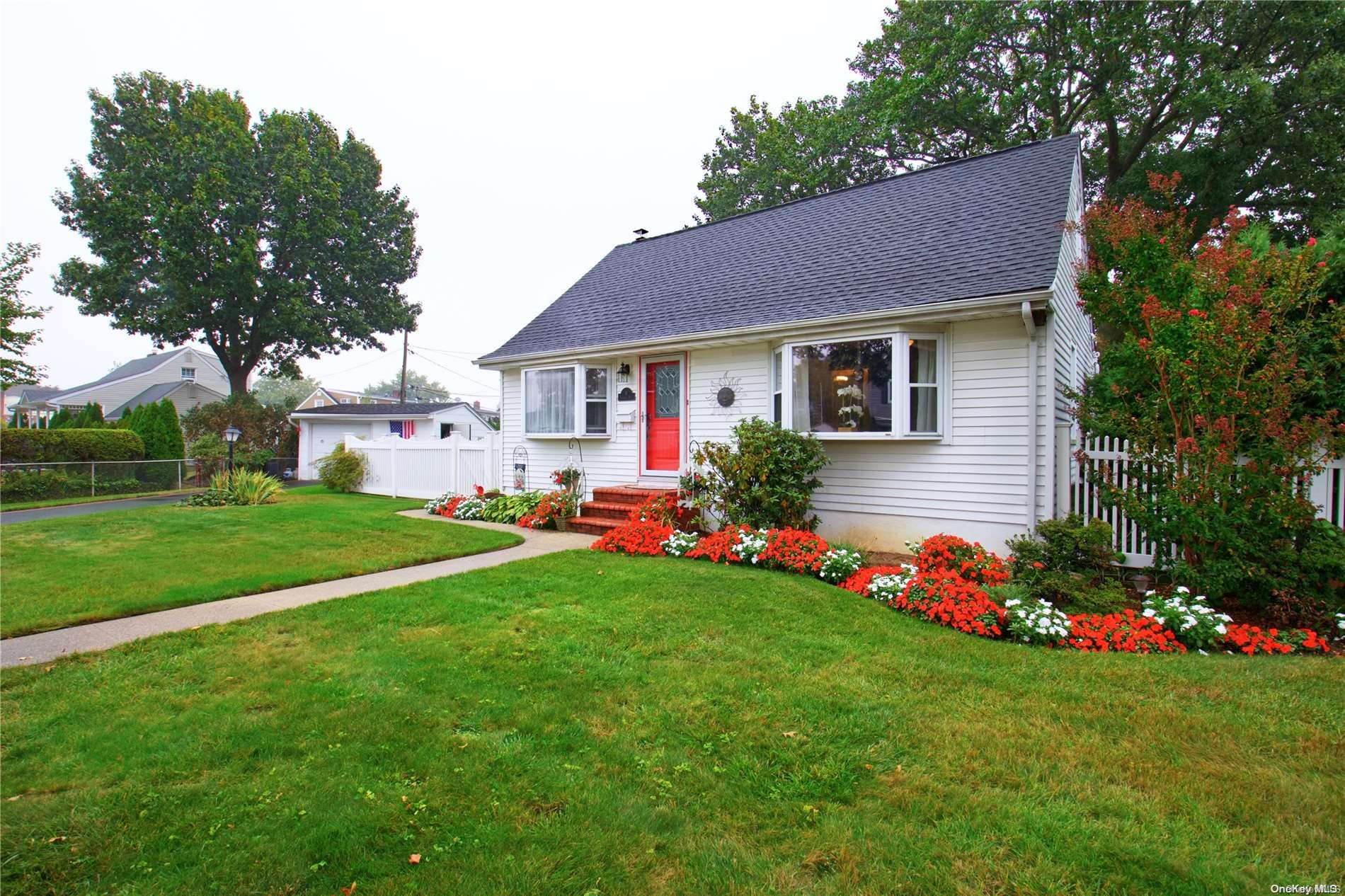 11 Farmedge Road Bethpage, NY 11714 - Photo 1 of 1 Front with beautiful foliage