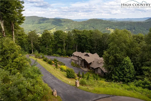 a view of a field with a mountain