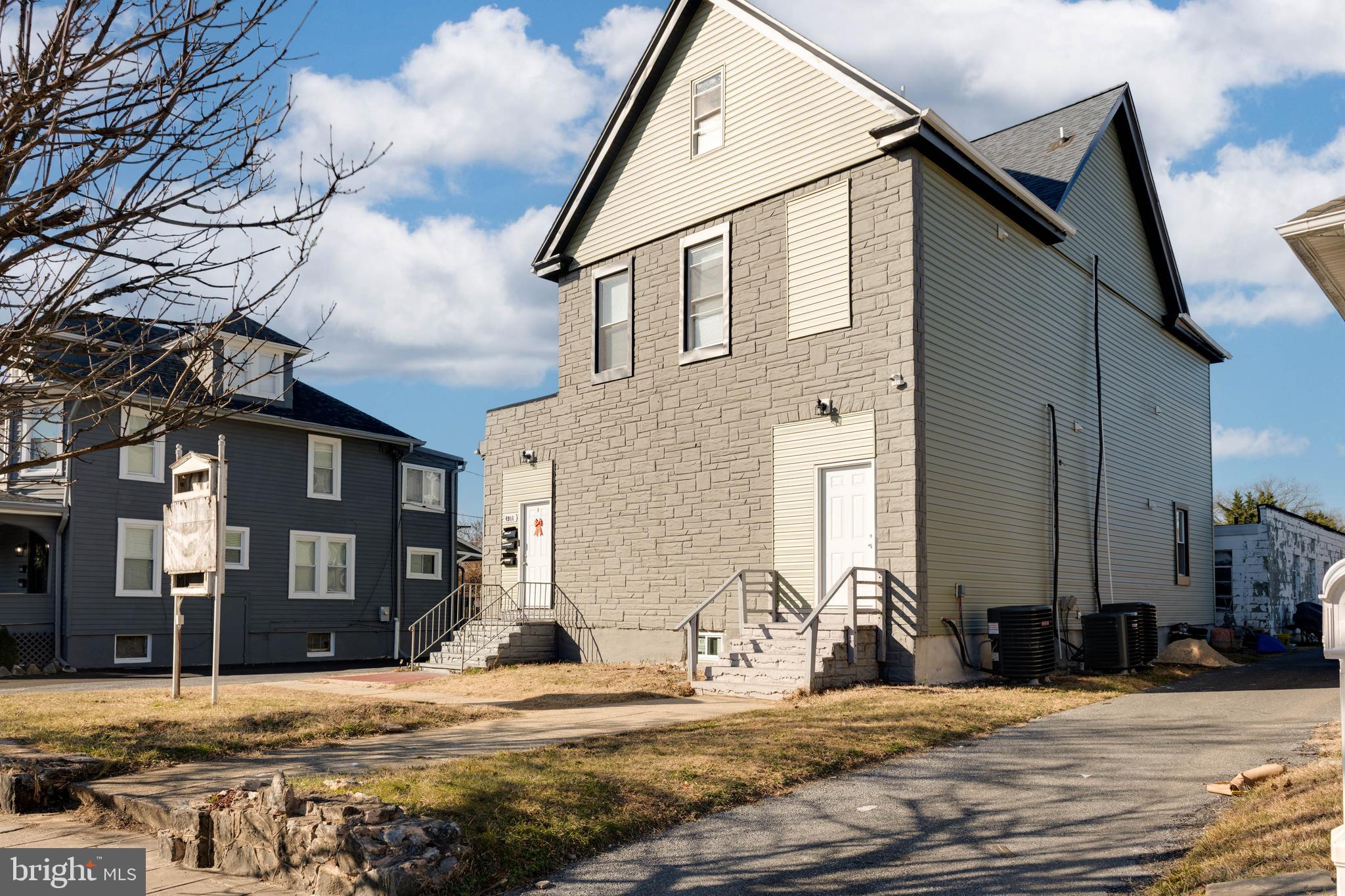 4906 Harford Road Baltimore, MD 21214 - Photo 2 of 31 a view of a house with snow on the road