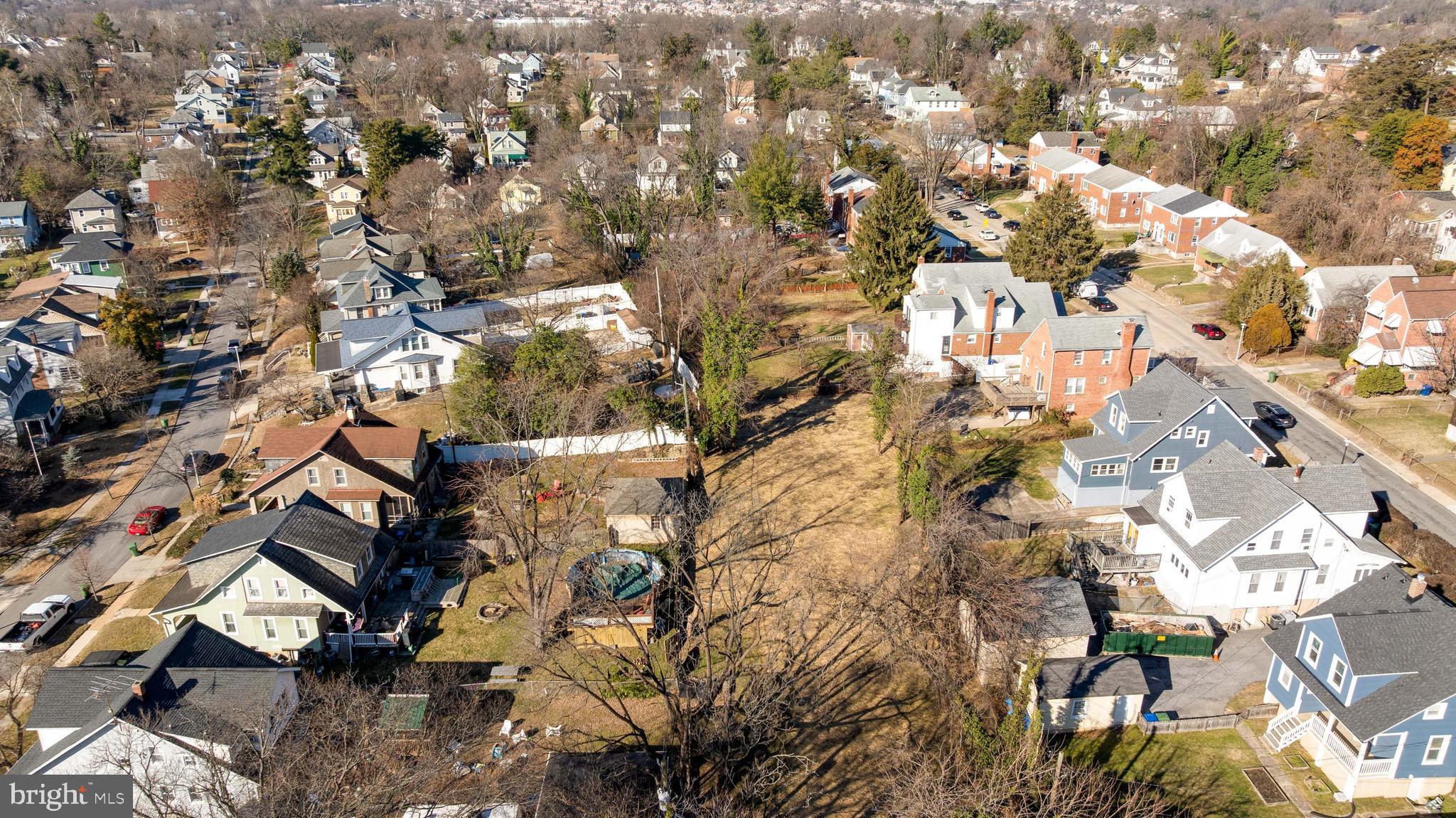 4906 Harford Road Baltimore, MD 21214 - Photo 21 of 31 a view of outdoor space with lots of trees