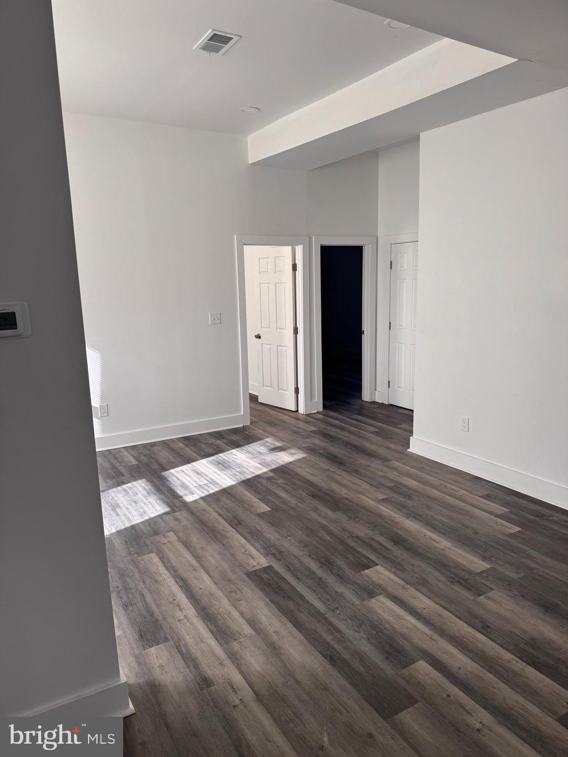4906 Harford Road Baltimore, MD 21214 - Photo 31 of 31 a view of a room with wooden floor