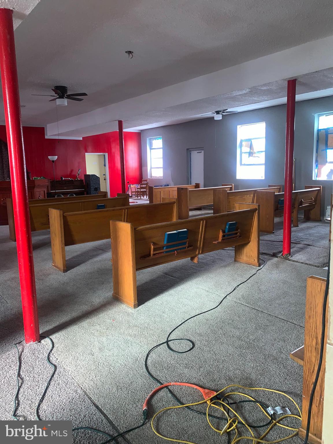 4906 Harford Road Baltimore, MD 21214 - Photo 7 of 31 a living room with furniture a air conditioner vent and a window