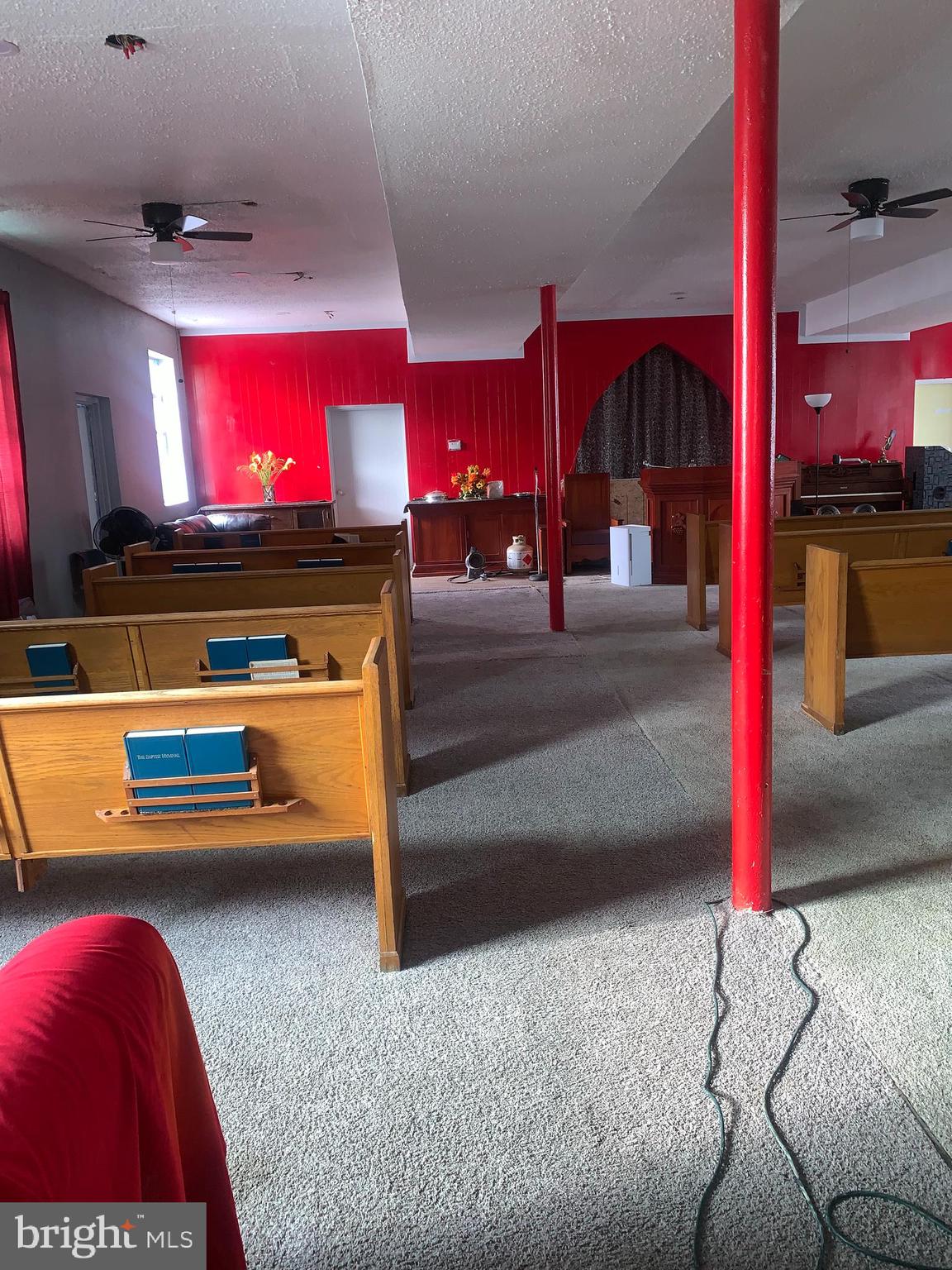 4906 Harford Road Baltimore, MD 21214 - Photo 8 of 31 a view of lobby with furniture and a projector