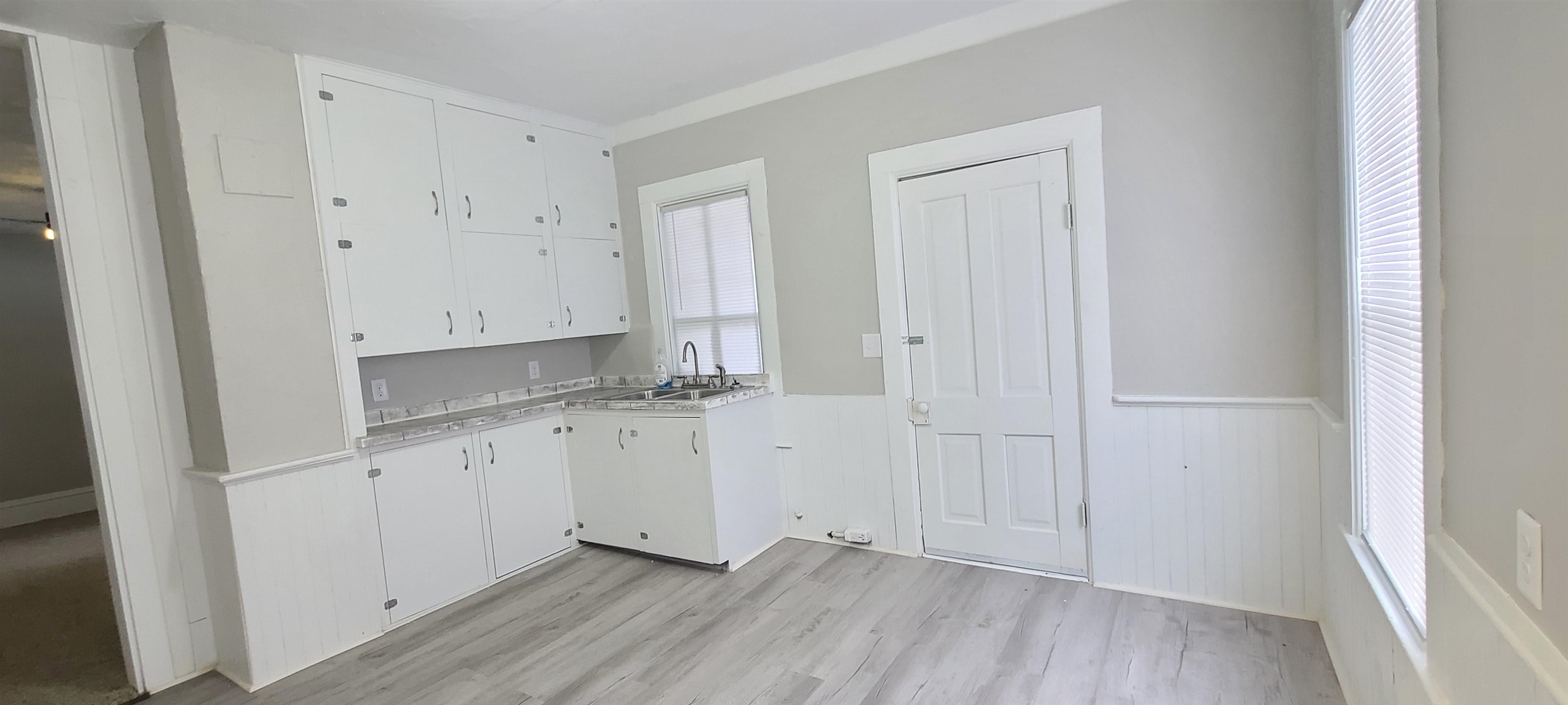 894 Bend Road Dixon, IL 61021 - Photo 7 of 23 a room with a sink and a mirror
