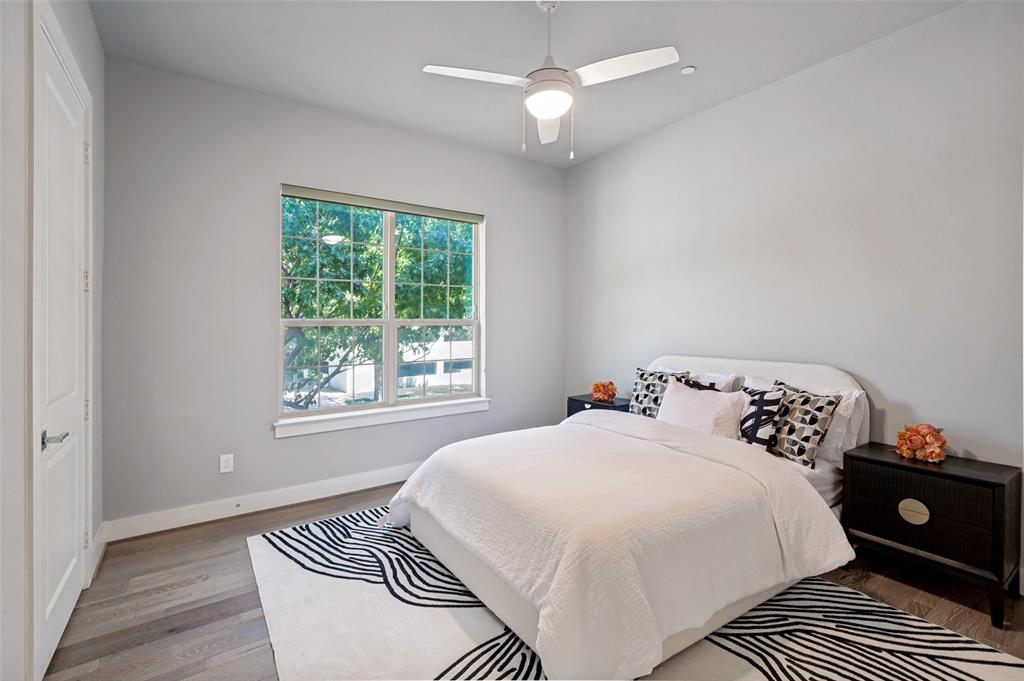 15875 Spectrum Drive, Unit 1101 Addison, TX 75001 - Photo 24 of 37 Secondary bedroom with tree top views