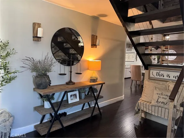 a view of a chairs and wooden floor