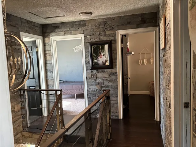 a view of hallway with washer and dryer