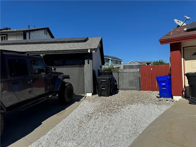 a view of a car park in front of garage