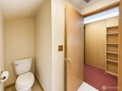 a bathroom with a shower and a shower curtain