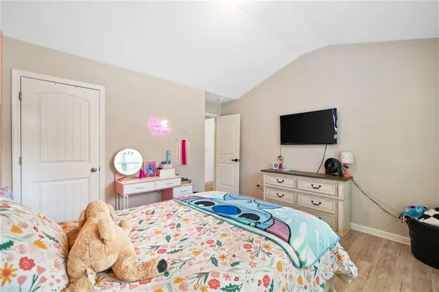 a view of a patio with a table chairs and a backyard