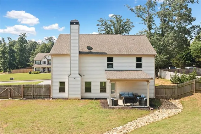 a view of a house with a swimming pool
