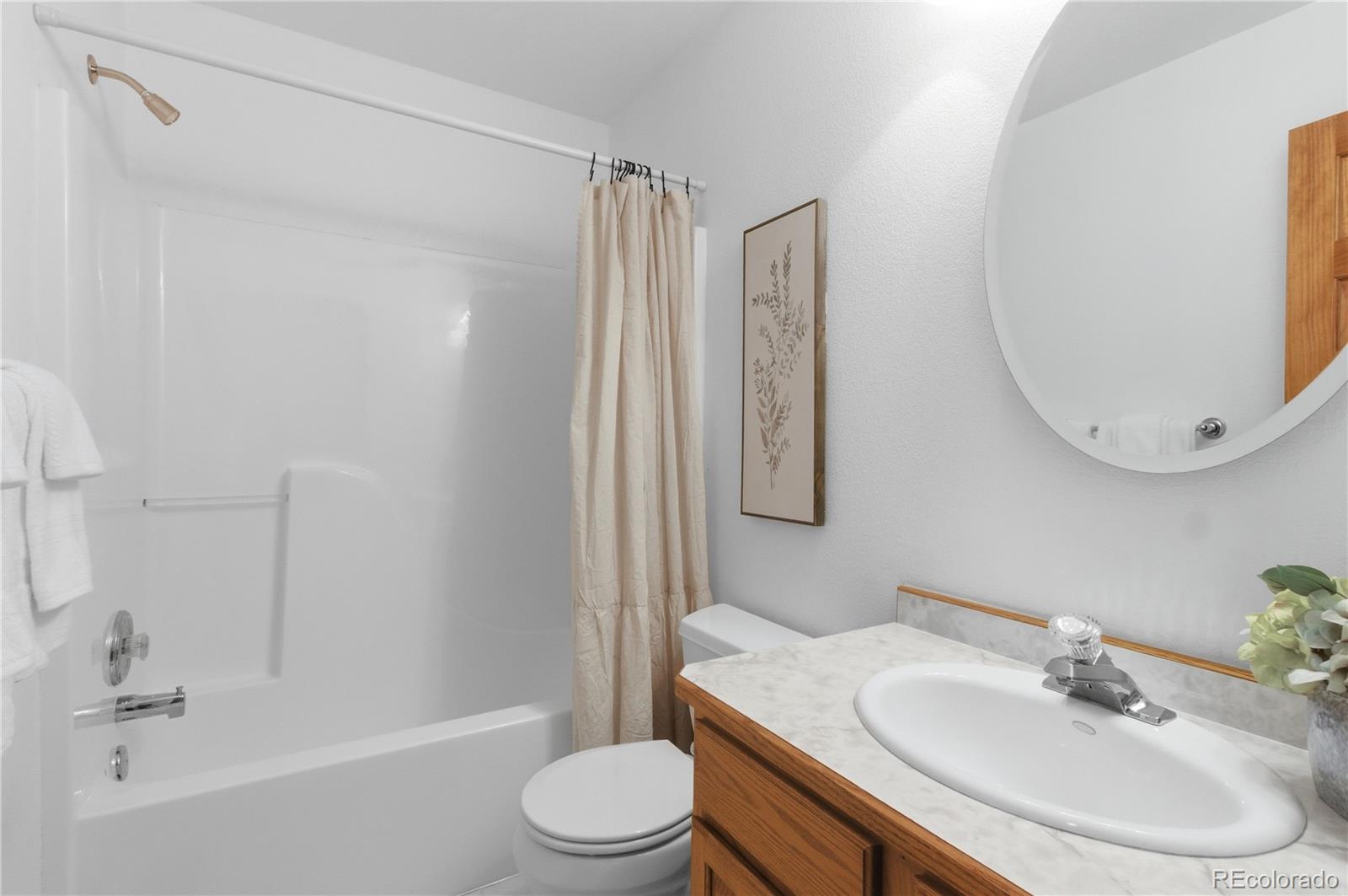 90 Riggs Road Westcliffe, CO 81252 - Photo 15 of 35 a bathroom with a sink toilet and shower