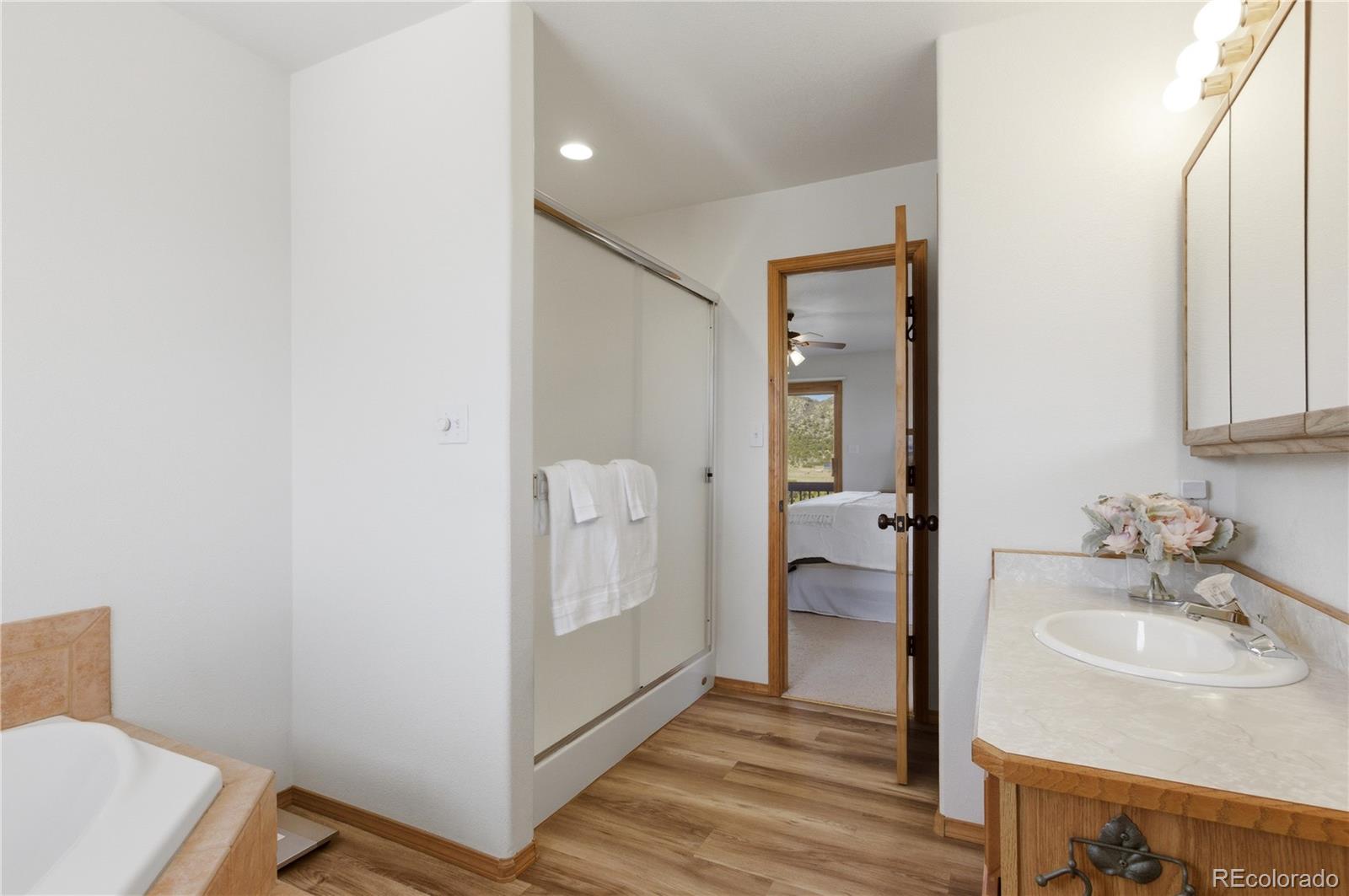 90 Riggs Road Westcliffe, CO 81252 - Photo 20 of 35 a bathroom with a sink and a mirror