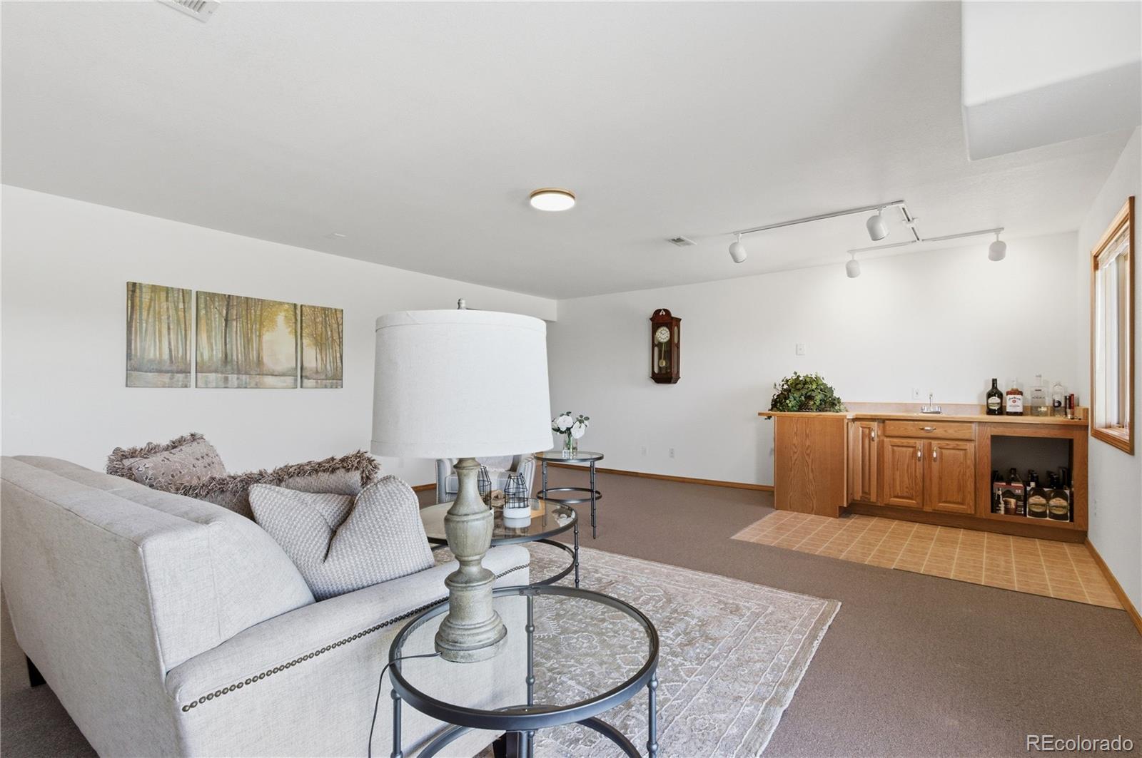 90 Riggs Road Westcliffe, CO 81252 - Photo 22 of 35 a living room with furniture and a wooden floor
