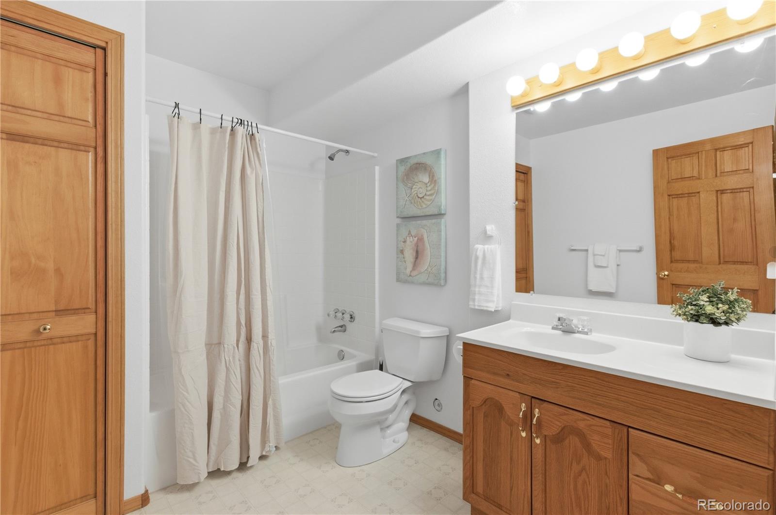 90 Riggs Road Westcliffe, CO 81252 - Photo 26 of 35 a bathroom with a sink a toilet and shower