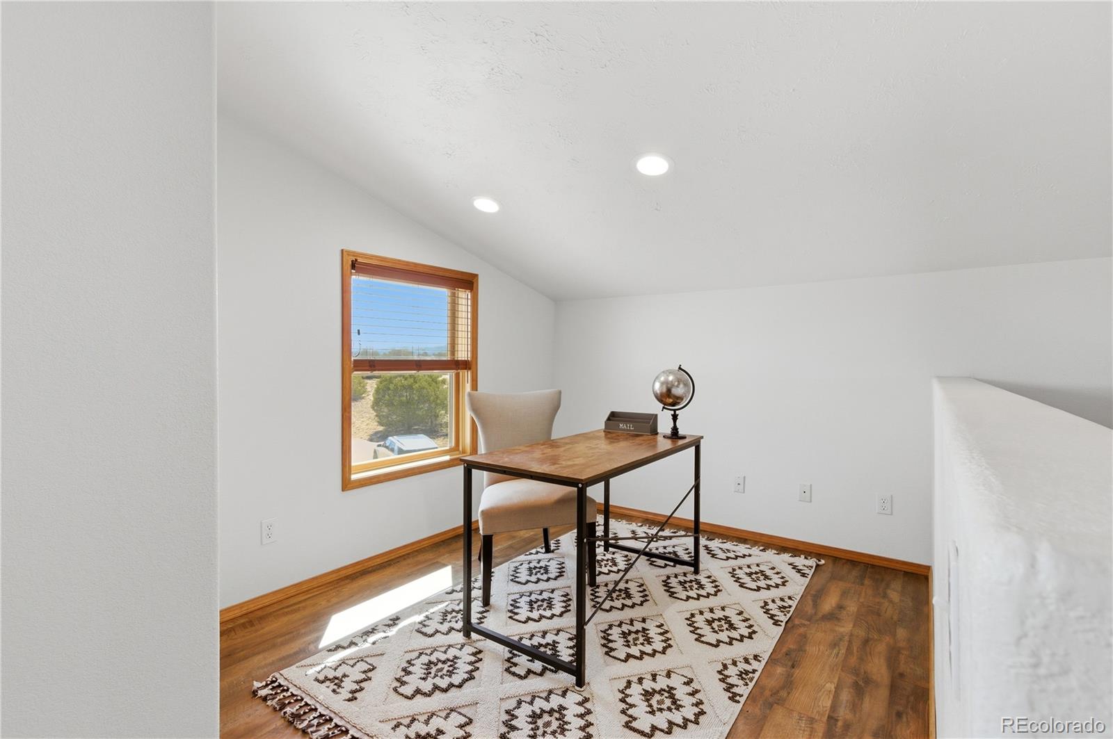 90 Riggs Road Westcliffe, CO 81252 - Photo 28 of 35 a view of a workspace with furniture