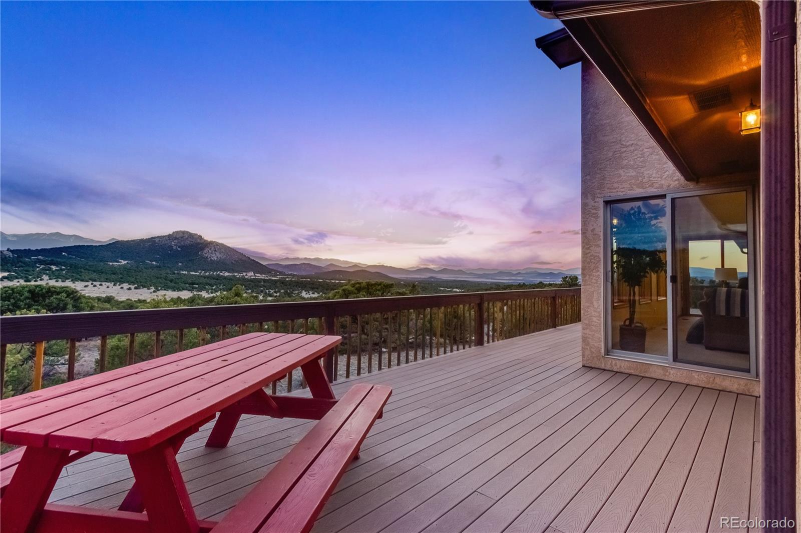 90 Riggs Road Westcliffe, CO 81252 - Photo 3 of 35 a view of a roof deck with lounge chair