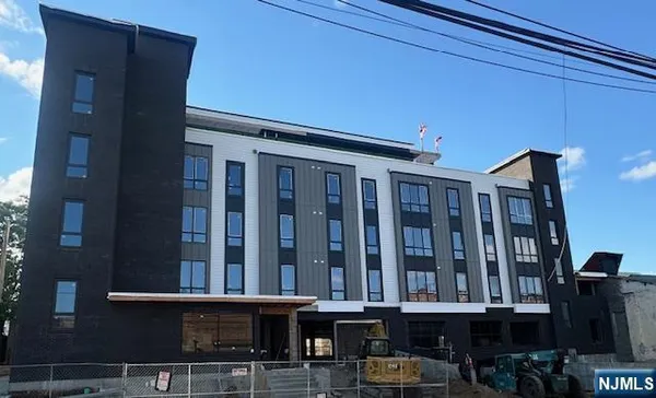 a front view of a building with glass windows