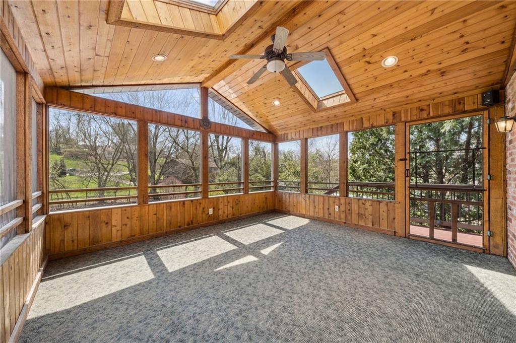 153 Oakwood Road Canonsburg, PA 15317 - Photo 22 of 26 an empty room with wooden floor and windows