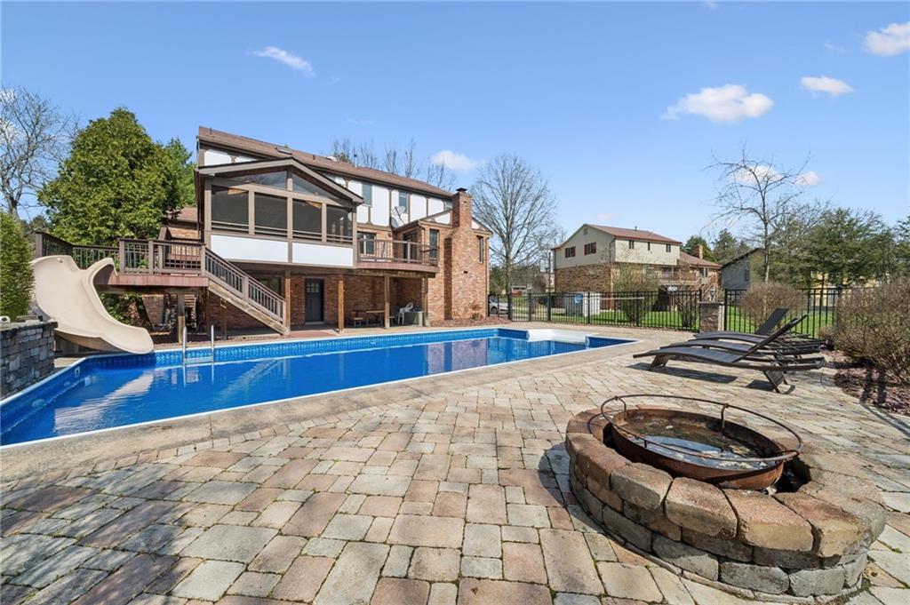 153 Oakwood Road Canonsburg, PA 15317 - Photo 24 of 26 a view of a house with swimming pool and sitting area