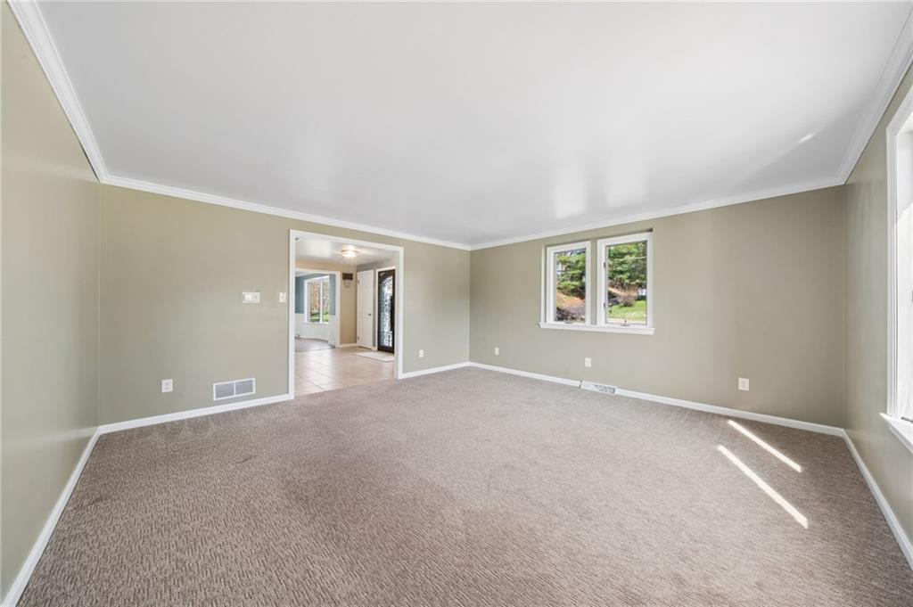 153 Oakwood Road Canonsburg, PA 15317 - Photo 7 of 26 a view of an empty room with a window