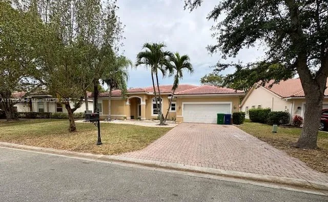 $850,000 | 10261 Northwest 54th Place, Coral Springs, FL 33076