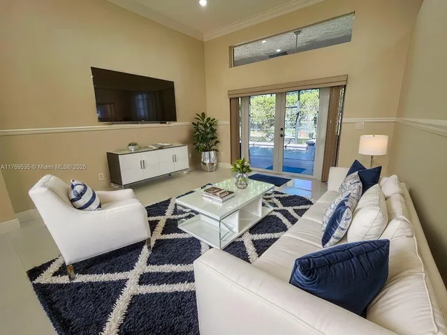 $850,000 | 10261 Northwest 54th Place, Coral Springs, FL 33076