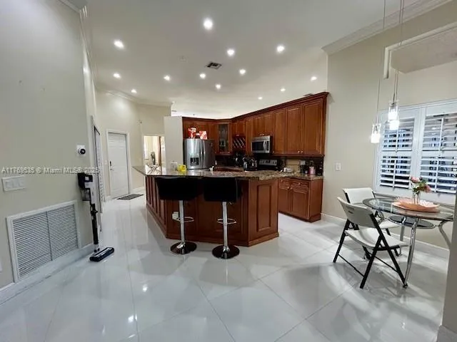 $850,000 | 10261 Northwest 54th Place, Coral Springs, FL 33076