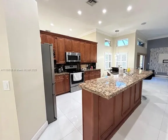 $850,000 | 10261 Northwest 54th Place, Coral Springs, FL 33076