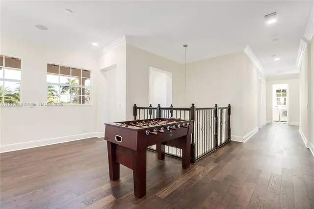 a spacious bedroom with a bed and a couch