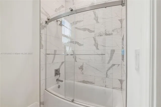 a view of a livingroom with furniture window and wooden floor