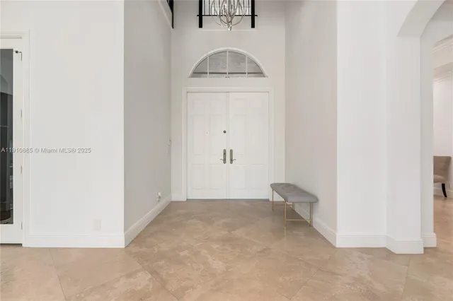 a kitchen with a sink stove and refrigerator