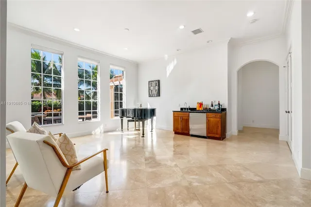 a living room with a couch and a view of living room