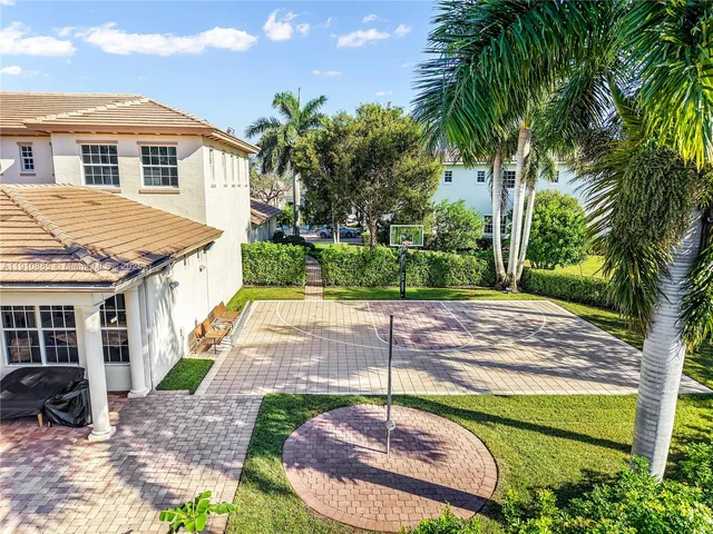a bedroom with a bed and a night stand