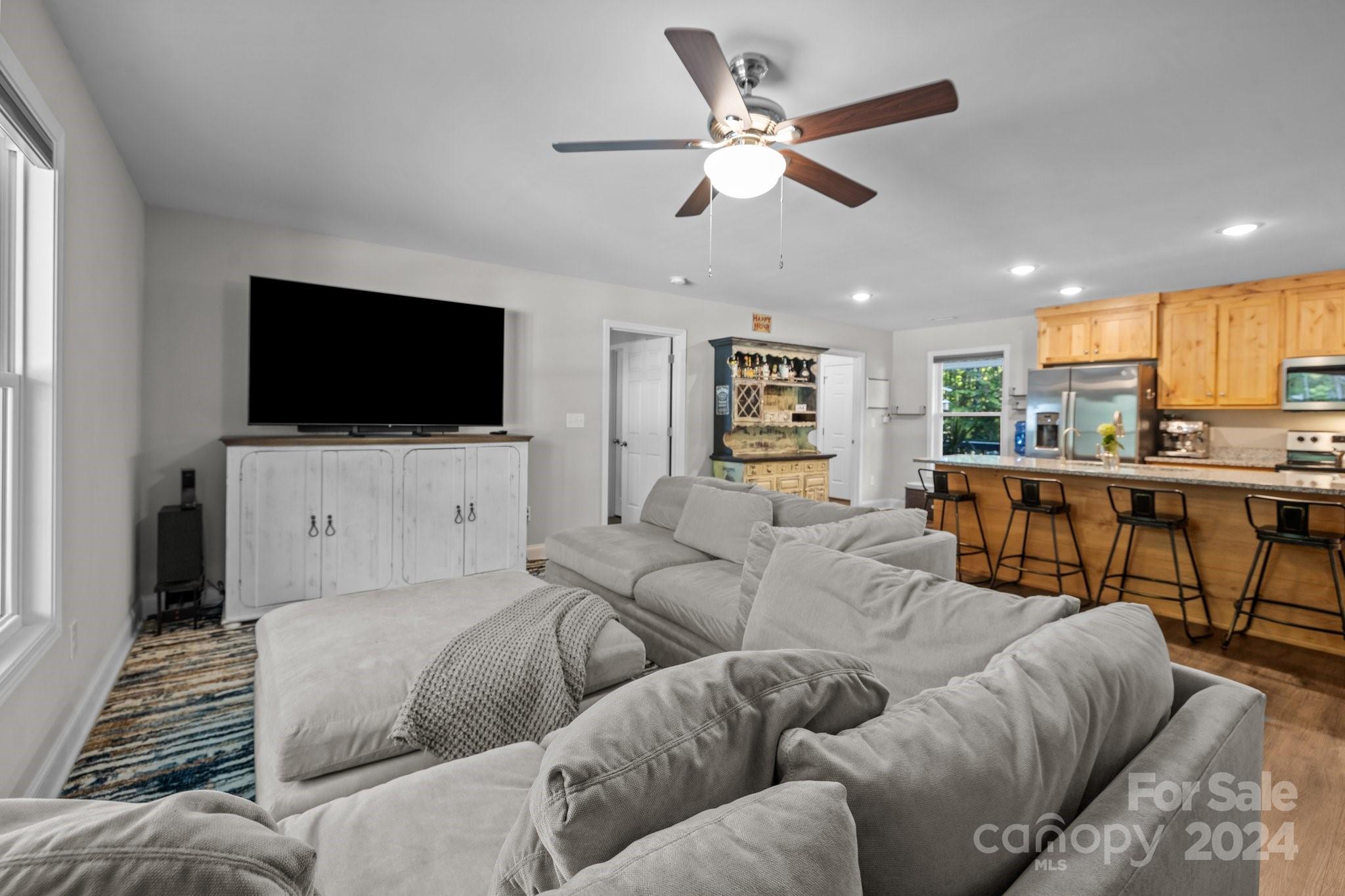 1455 Lawrence Road Clover, SC 29710 - Photo 11 of 35 a living room with furniture and a flat screen tv