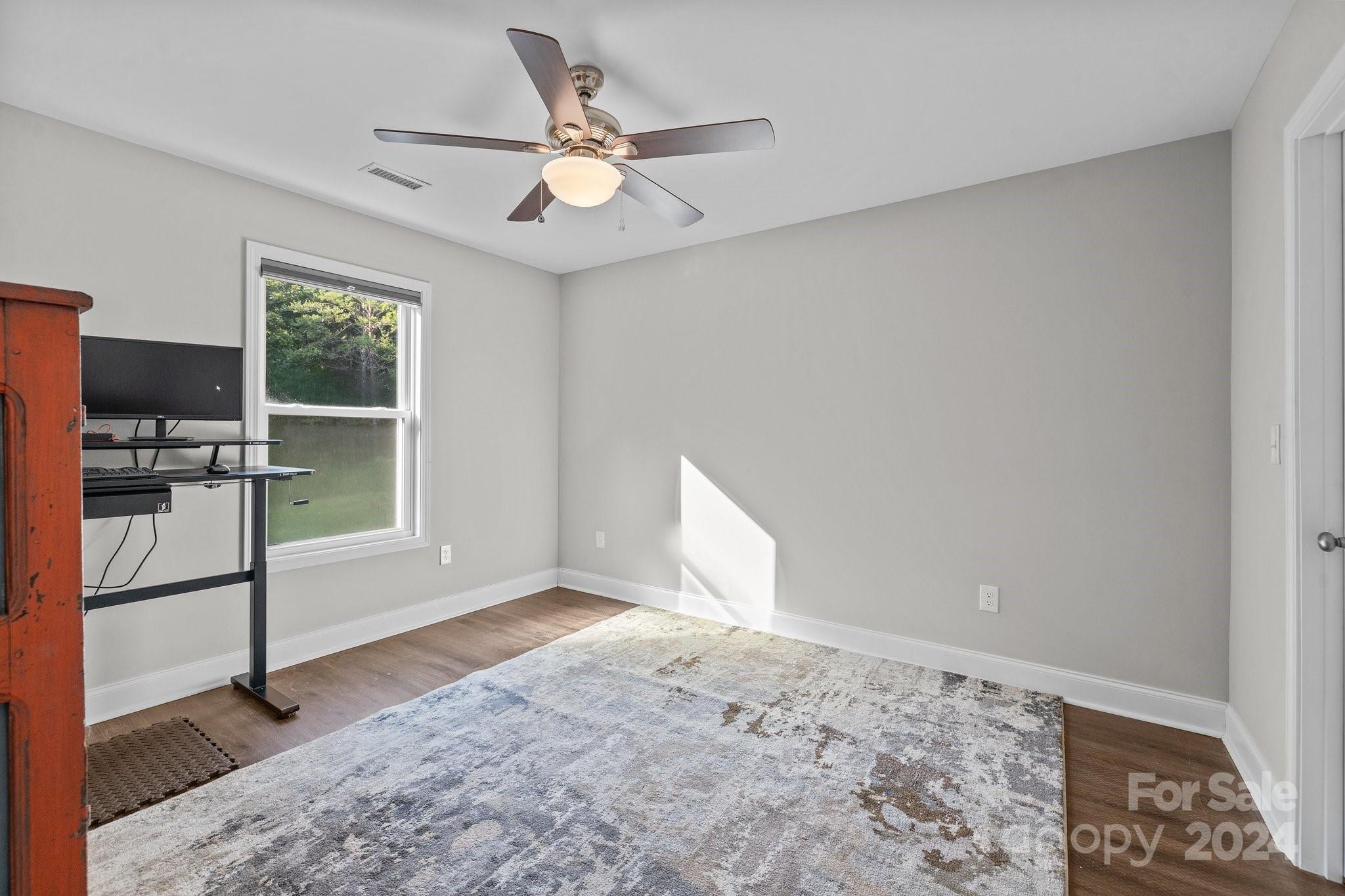 1455 Lawrence Road Clover, SC 29710 - Photo 16 of 35 a view of an empty room with a window