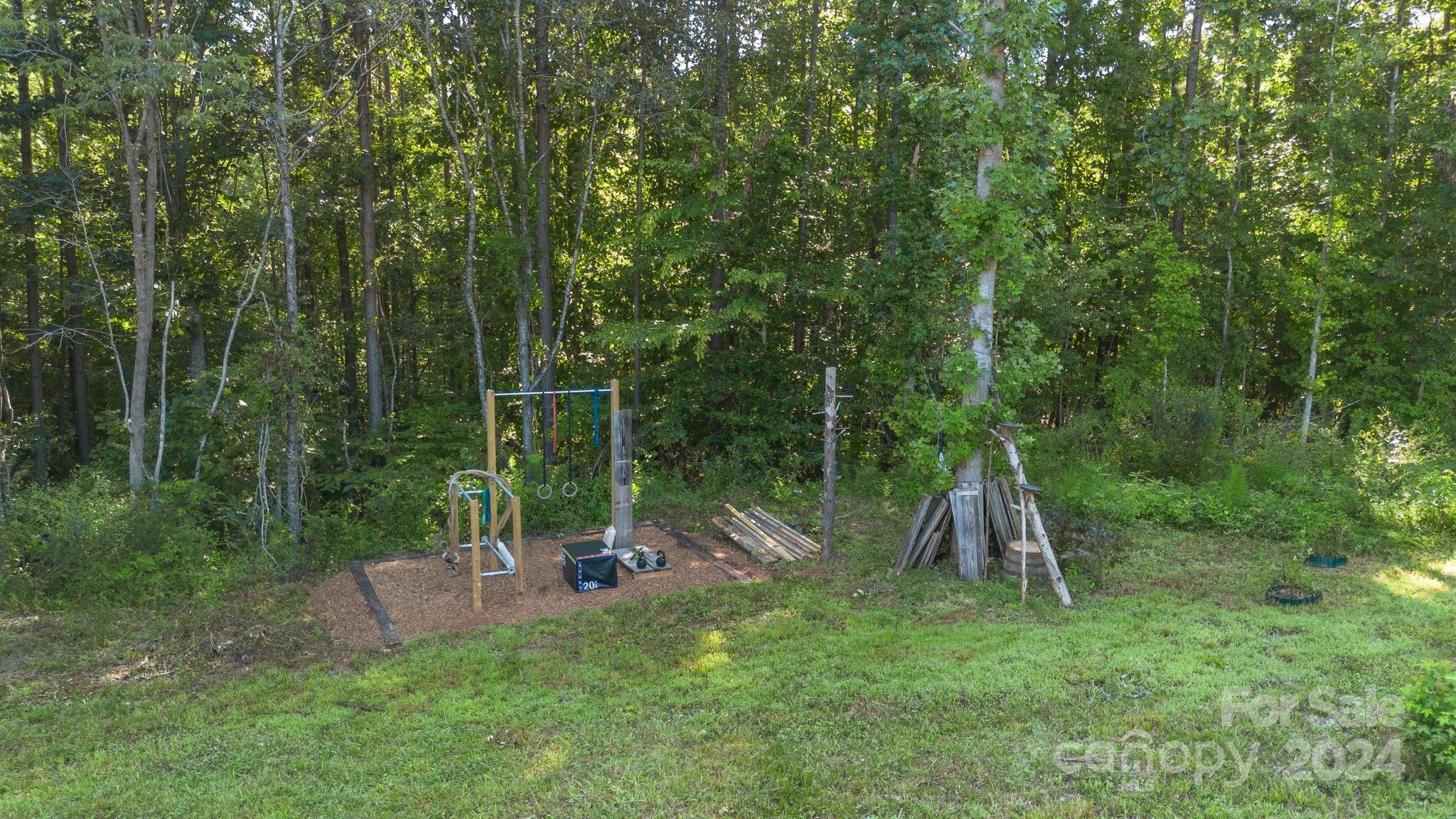 1455 Lawrence Road Clover, SC 29710 - Photo 25 of 35 a view of a park with a slide