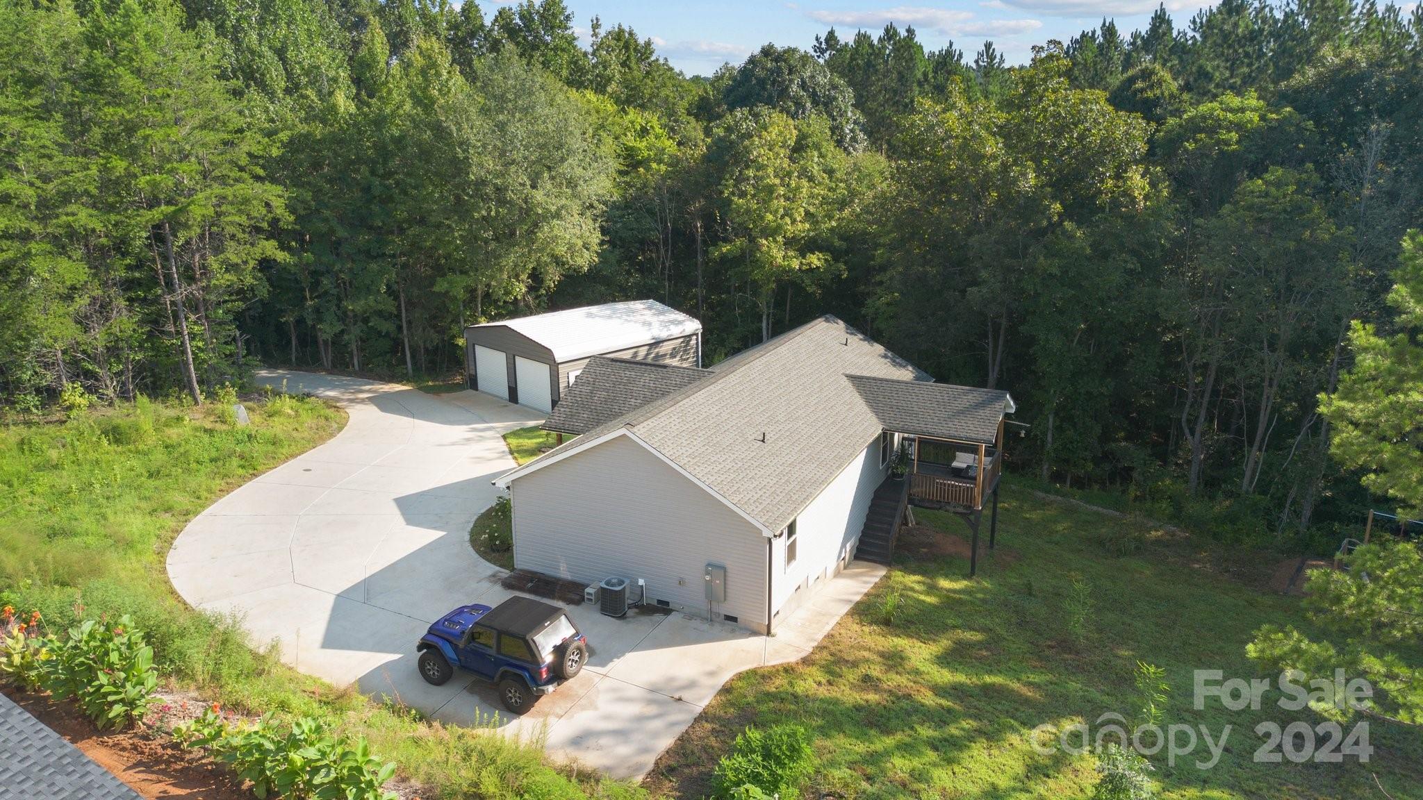 1455 Lawrence Road Clover, SC 29710 - Photo 3 of 35 an aerial view of a house with pool