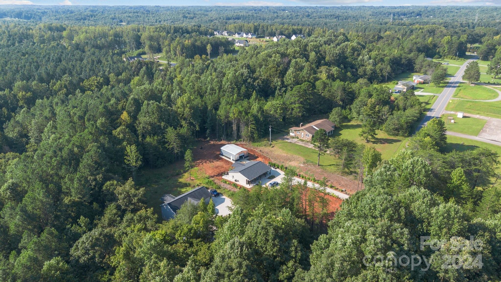 1455 Lawrence Road Clover, SC 29710 - Photo 32 of 35 an aerial view of a house with a yard