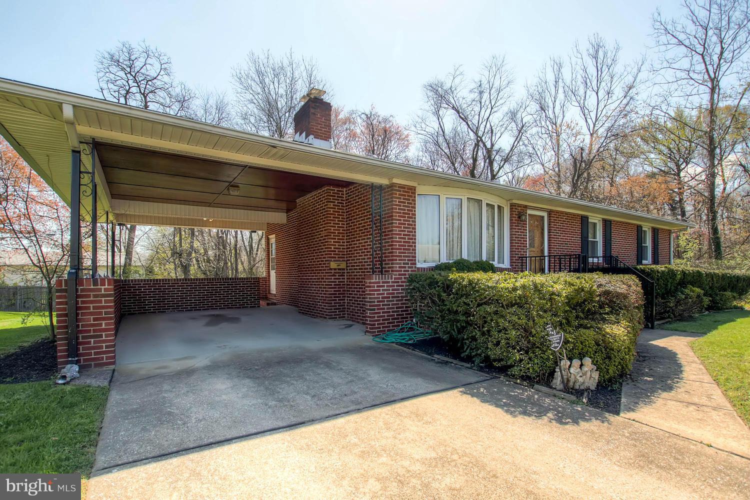 407 Homewood Road Linthicum, MD 21090 - Photo 22 of 23 a view of a house with a garden