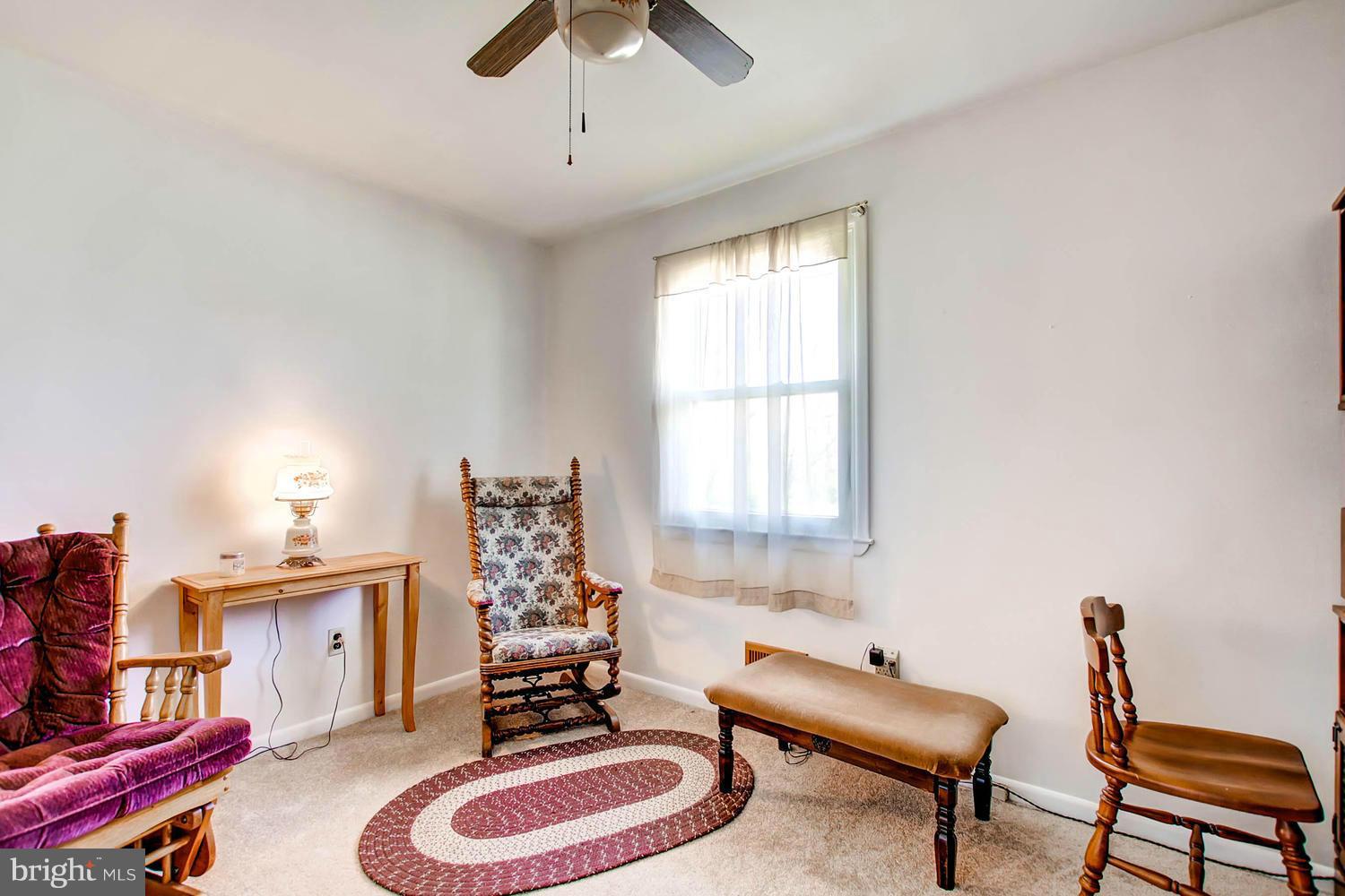 407 Homewood Road Linthicum, MD 21090 - Photo 8 of 23 a room with furniture and musical instruments