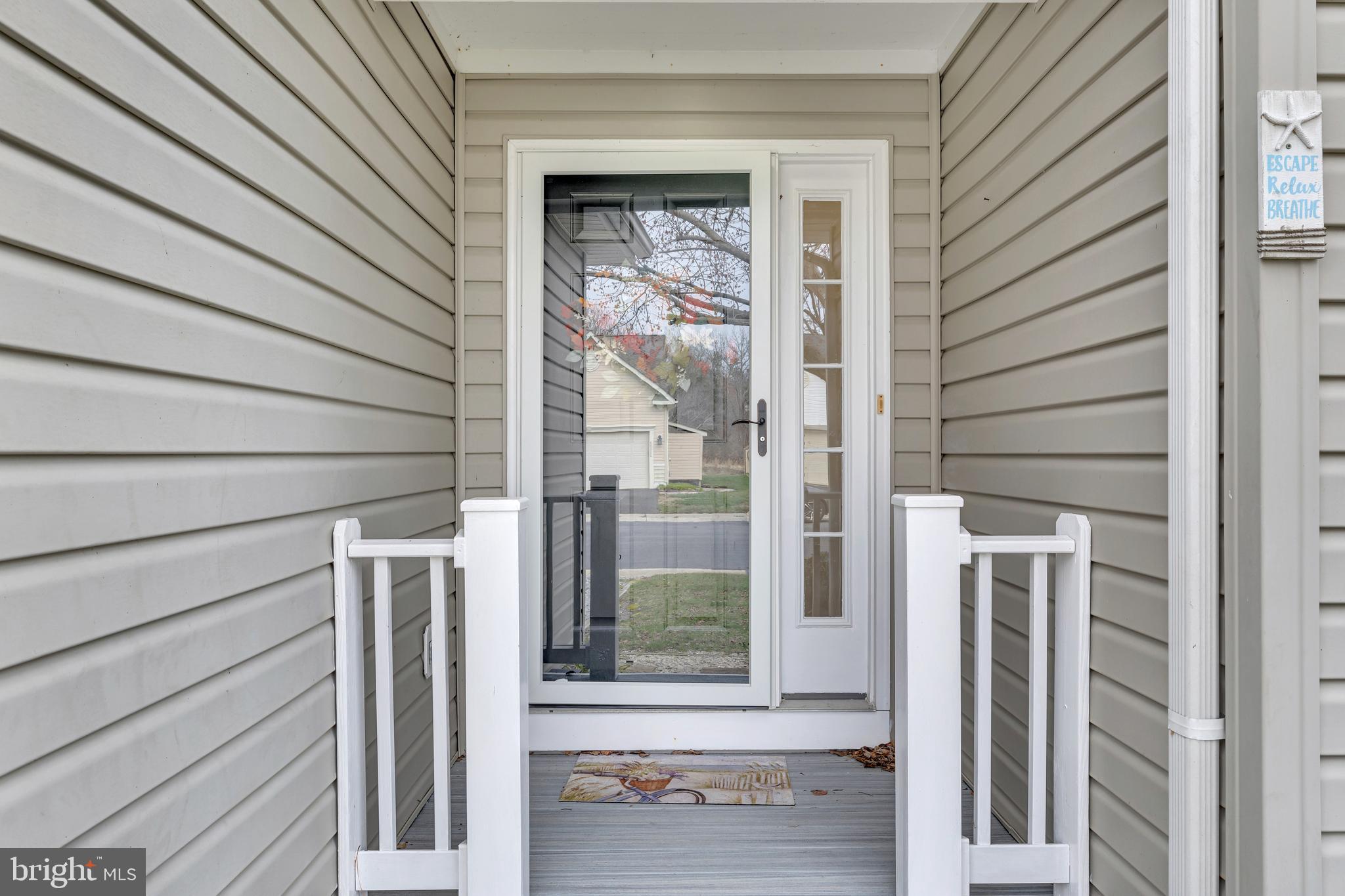 33525 Westhampton Lane Ocean View, DE 19970 - Photo 2 of 49 a view of a door of the house