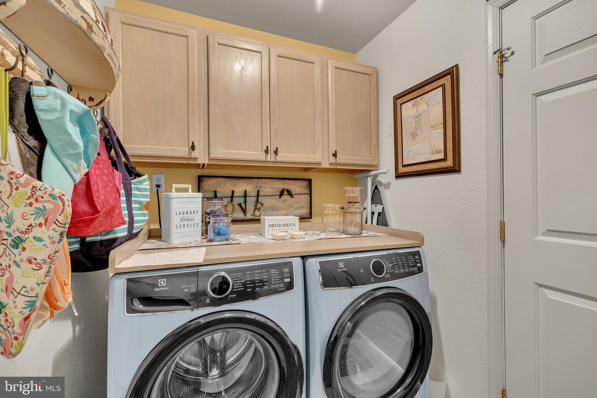 33525 Westhampton Lane Ocean View, DE 19970 - Photo 23 of 49 a utility room with dryer and washer