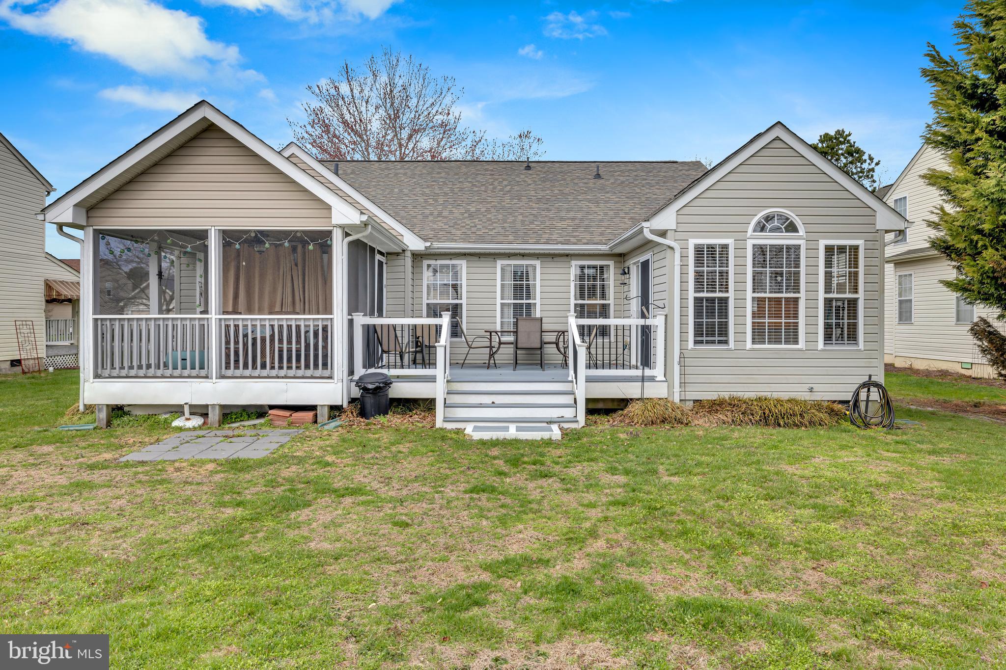 33525 Westhampton Lane Ocean View, DE 19970 - Photo 31 of 49 a front view of a house with a yard