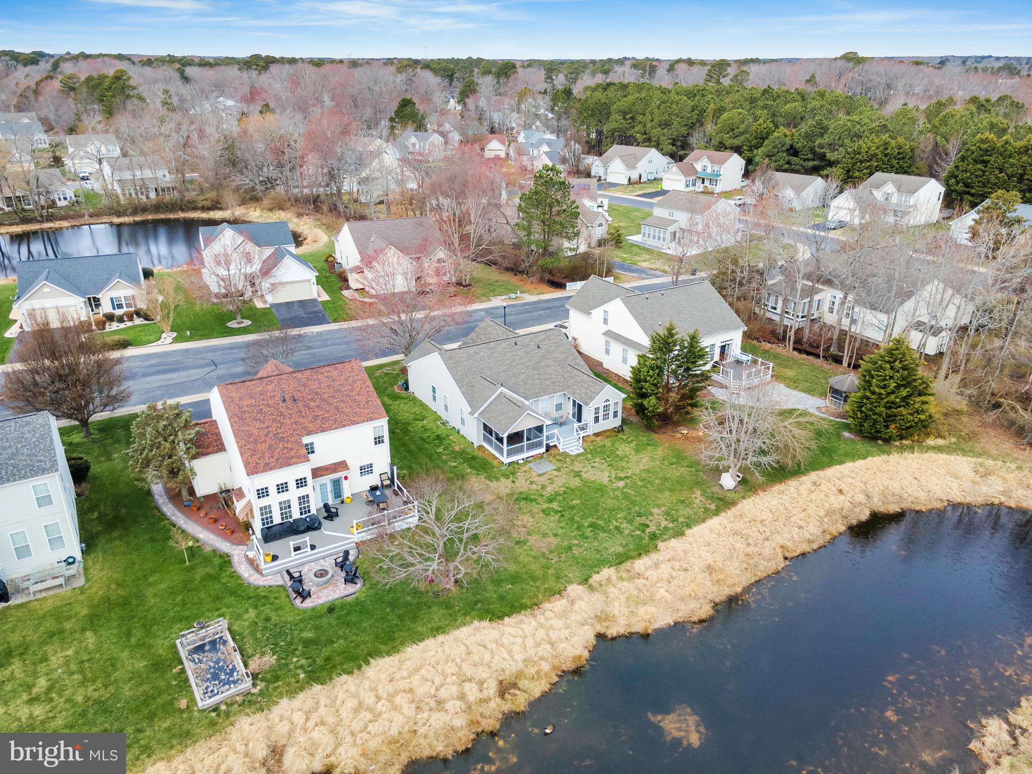 33525 Westhampton Lane Ocean View, DE 19970 - Photo 39 of 49 an aerial view of a house with a garden and lake view