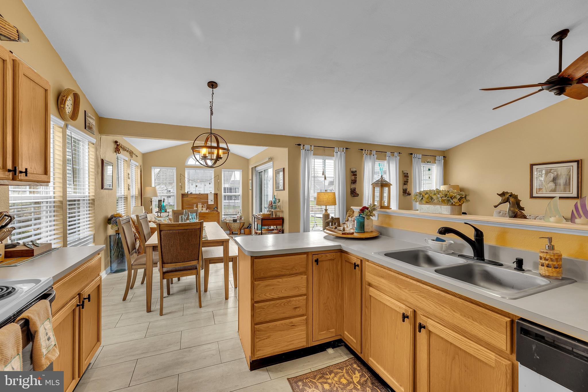 33525 Westhampton Lane Ocean View, DE 19970 - Photo 10 of 49 a very nice looking kitchen with granite countertop a large window