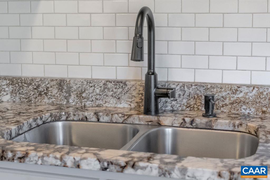 1436 Minor Ridge Court Charlottesville, VA 22901 - Photo 11 of 59 a view of a sink and granite counter top